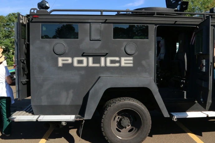 Armored police vehicle with doors open